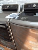 set-lg-top-load-washer-wt7400cv-and-electric-dryer-dle7309ve