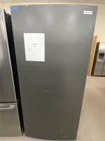 Tall gray Frigidaire refrigerator on display with a sale-price sign showing $650 attached to the door