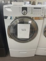 img_5142-2 - Discount Appliances White Samsung front-loading washing machine on display with a sale price tag reading $250.00 attached to the door.