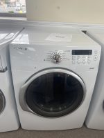 img_5290-3 - Discount Appliances Samsung front-loading washing machine in a showroom with a sale price sign on top ($195.00)