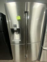 Stainless steel Samsung French-door refrigerator with bottom freezer and water dispenser on the left door