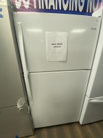 White Whirlpool refrigerator with a sale-price note taped to the door reading 'SALE PRICE $450.00' inside a starburst outline. A 33" label is visible on the top right, and a blue banner is above.