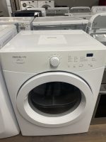 Front-loading Frigidaire Affinity washer in a showroom with a price label on top and control dial on the right labeled settings.