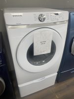 Front-loading Samsung washing machine with a sale sign reading 'SALE PRICE $350.00' attached to the door opening.