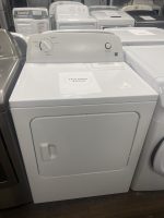 White front-loading? No, top-loading washing machine with control dial and pull-start button, display tag shows SALE PRICE $295.00 in a showroom.