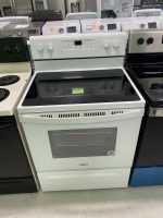 b0c9b0bf-1d12-41db-a9c0-d59a80cf8987-58473-0000066288f5b6b2_file - Discount Appliances White Whirlpool electric range with a smooth glass-ceramic cooktop and central control panel in a showroom.