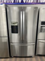 img_0179 - Discount Appliances Stainless steel Whirlpool French-door refrigerator with water/ice dispenser on the left door and a bottom freezer drawer.